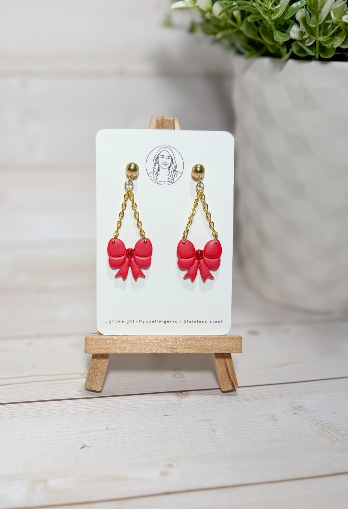 Red Christmas Bow Dangle Earrings – Handmade Polymer Clay Ribbon Earrings with Gold Chain, Festive Chain Jewelry