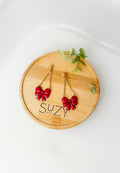 Red Christmas Bow Dangle Earrings – Handmade Polymer Clay Ribbon Earrings with Gold Chain, Festive Chain Jewelry